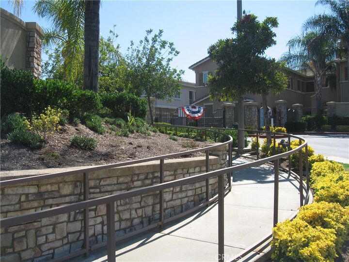 Property Photo: 26302 Arboretum Way 105 CA 92563
