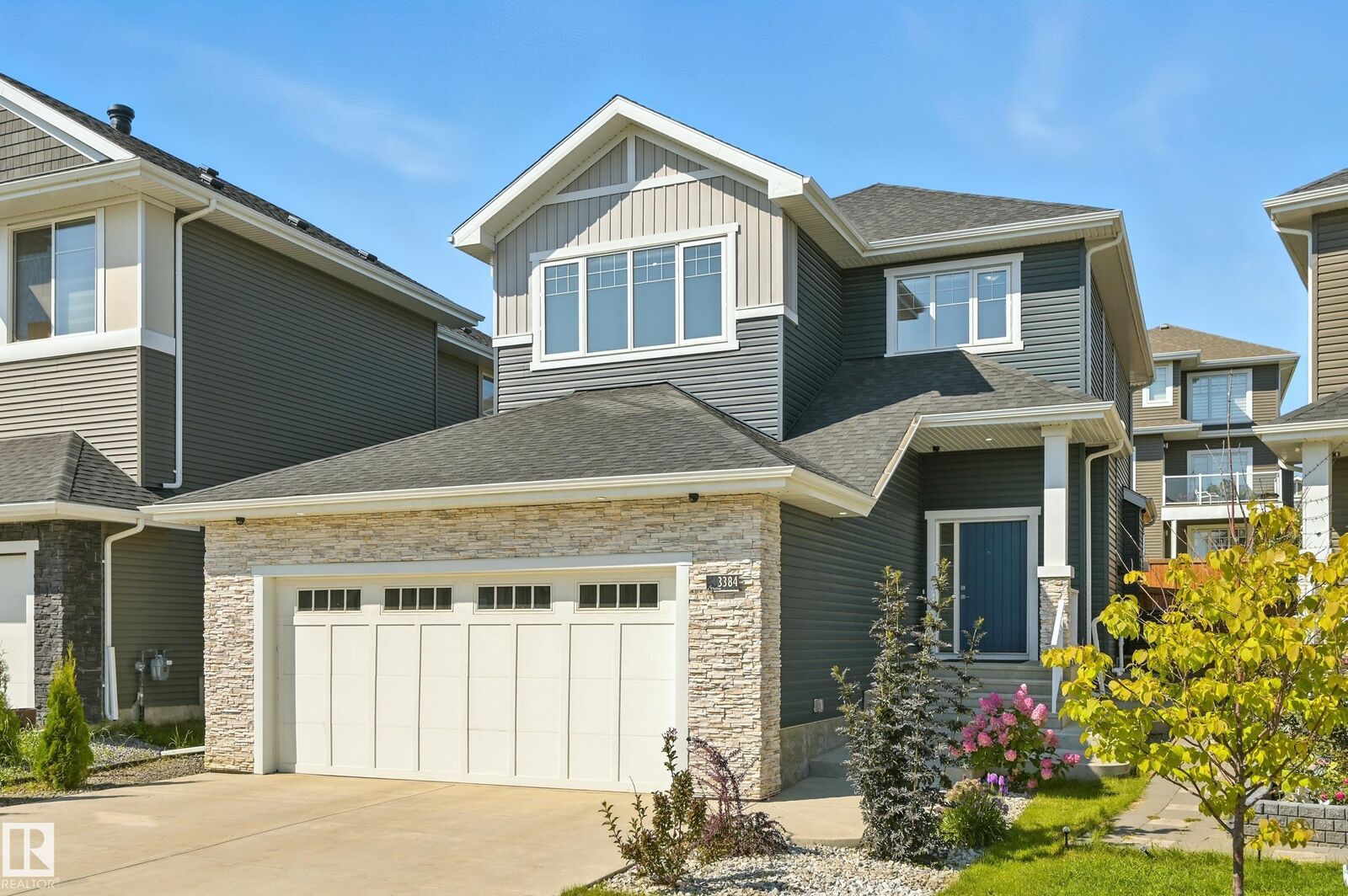 Property Photo: 3384 Chickadee Drive NW AB T5S 0L2