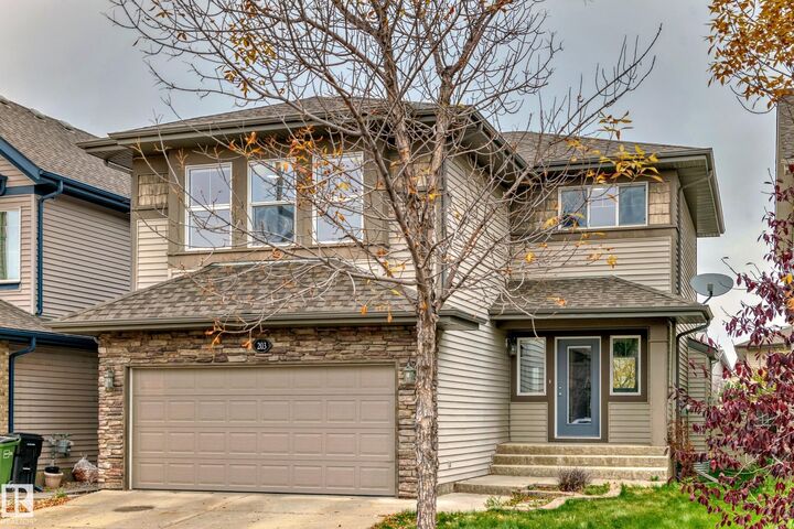 Property Photo: 203 Caldwell Way NW AB T6M 2X2