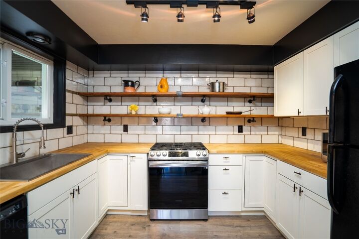 Property Photo:  210 S 16th D  MT 59715 