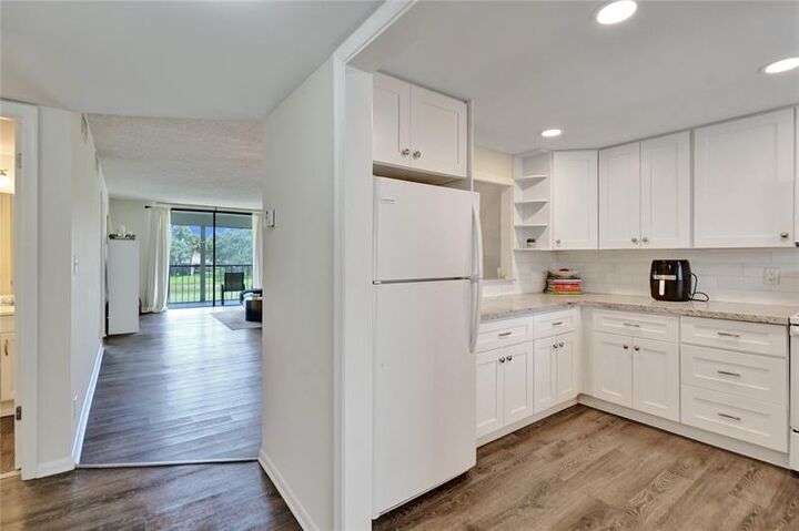 Property Photo: 2410 Deer Creek Country Club Blvd 202-E FL 33442