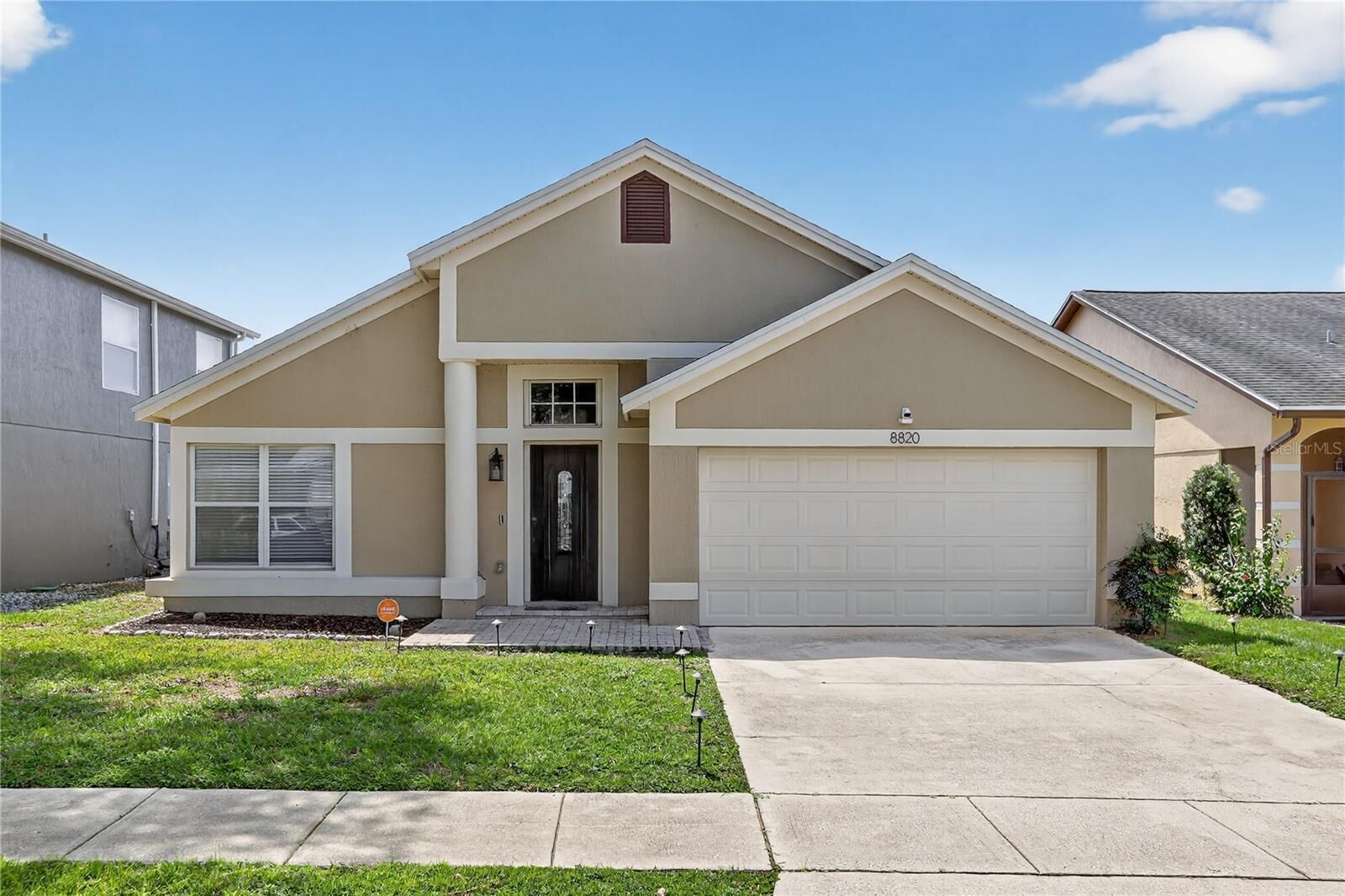 Property Photo: 8820 Tottenham Way FL 34747