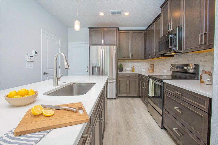 Property Photo: 8669 Tavistock Lakes Boulevard FL 32827