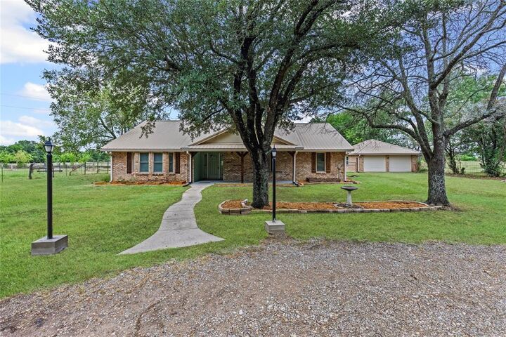 Property Photo: 208 County Road 1080 TX 75432