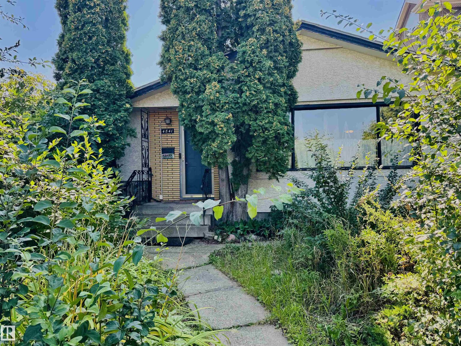 Property Photo: 4841 114 Avenue NW AB T5W 0T7