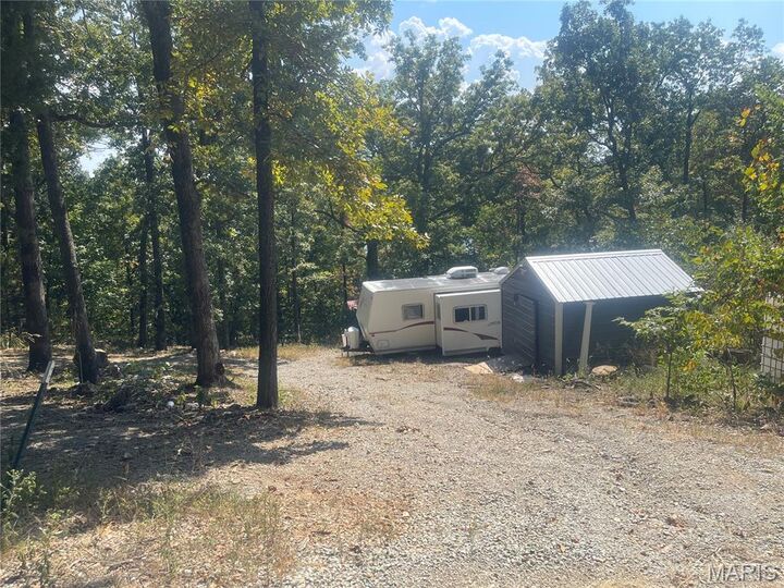 Property Photo:  9220 Mulqueen Lane  MO 63036 