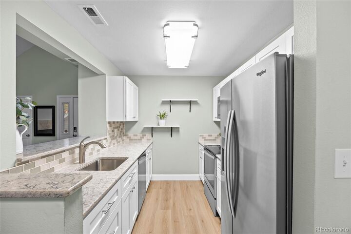 Property Photo:  6756 S Ivy Street B3  CO 80112 