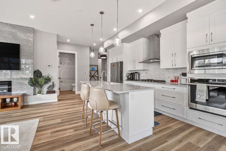Property Photo: 7463 May Common NW 122 AB T6R 0X1