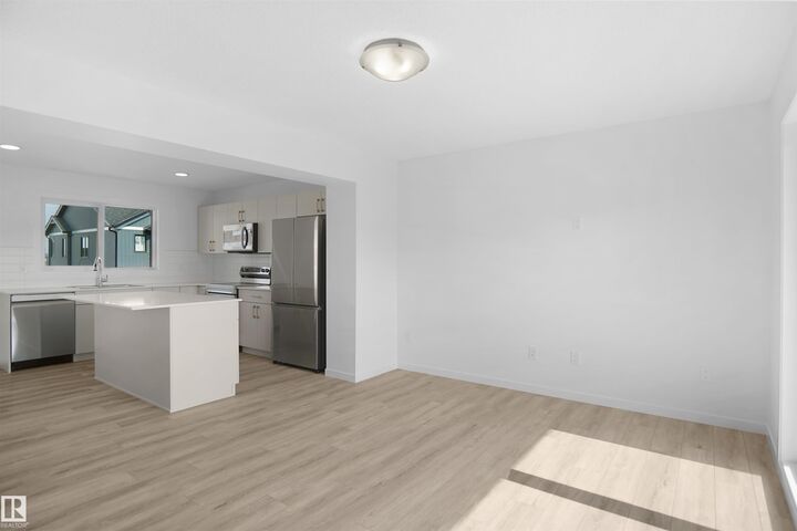 Property Photo: 1430 Aster Way NW 16 AB T6T 2N8