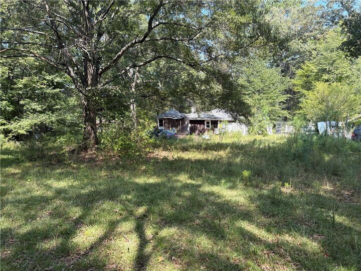 Property Photo:  6355 Kimberly Mill Road  GA 30349 