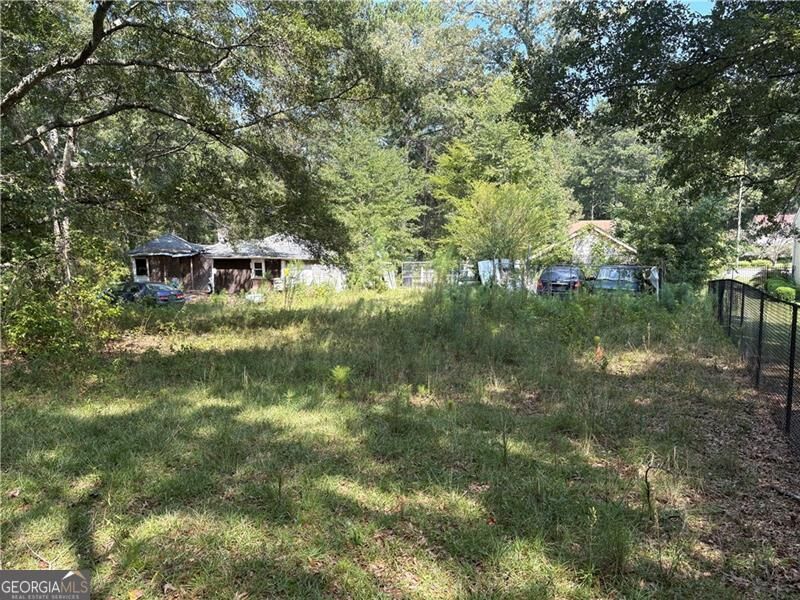Property Photo:  6355 Kimberly Mill Road  GA 30349 