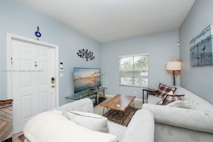 Property Photo:  814 SW 143rd Ter 208  FL 33027 