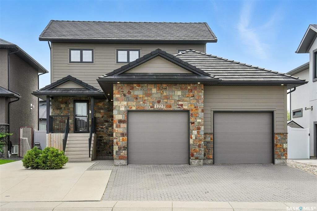 Property Photo:  122 Roy Crescent  SK S7W 0K9 