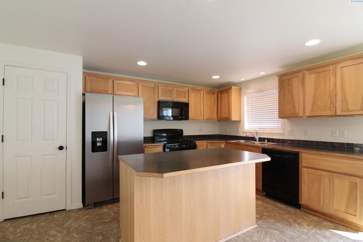 Property Photo: 5404 Coolidge Court WA 99301