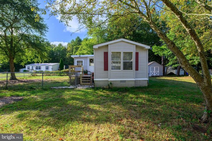Property Photo:  37088 E White Tail Drive  DE 19975 