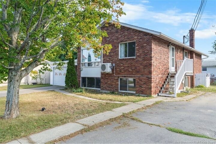 Property Photo:  883 Rue Landry  NB E2A 2V2 
