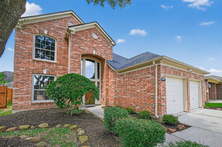 Property Photo: 2111 Pinecreek Pass Lane TX 77449