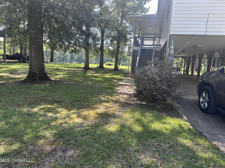 Property Photo: 148 Plum Bluff Drive MS 39452