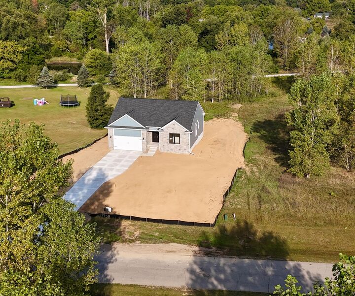 Property Photo:  9758 Iosco Ridge Drive  MI 48137 