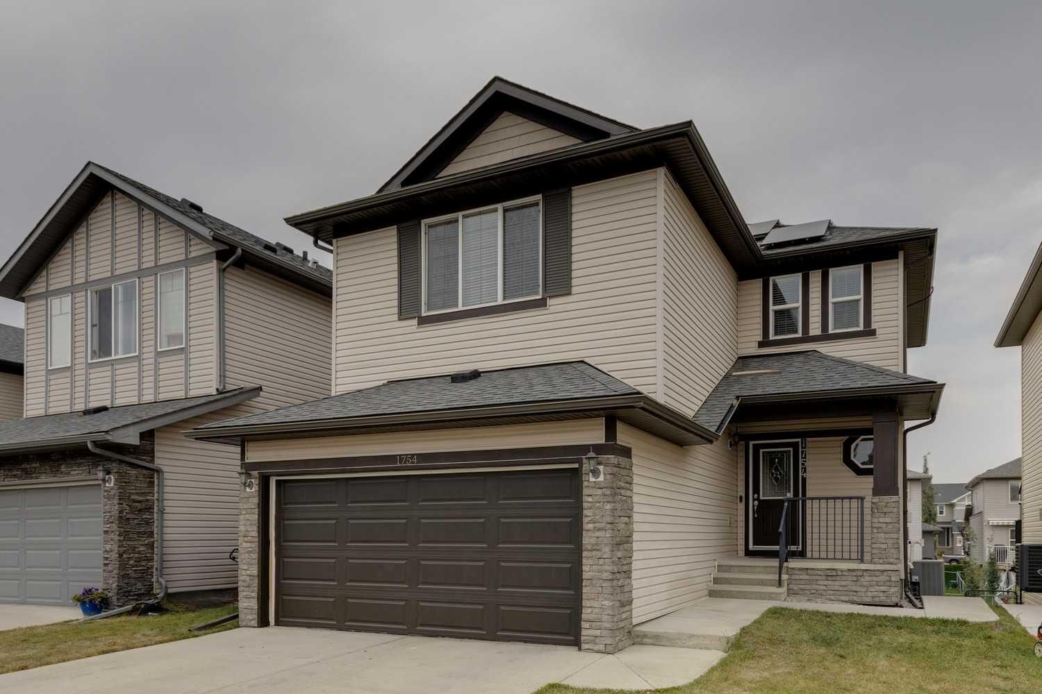 Property Photo: 1754 Baywater Drive SW AB T4B 0T7