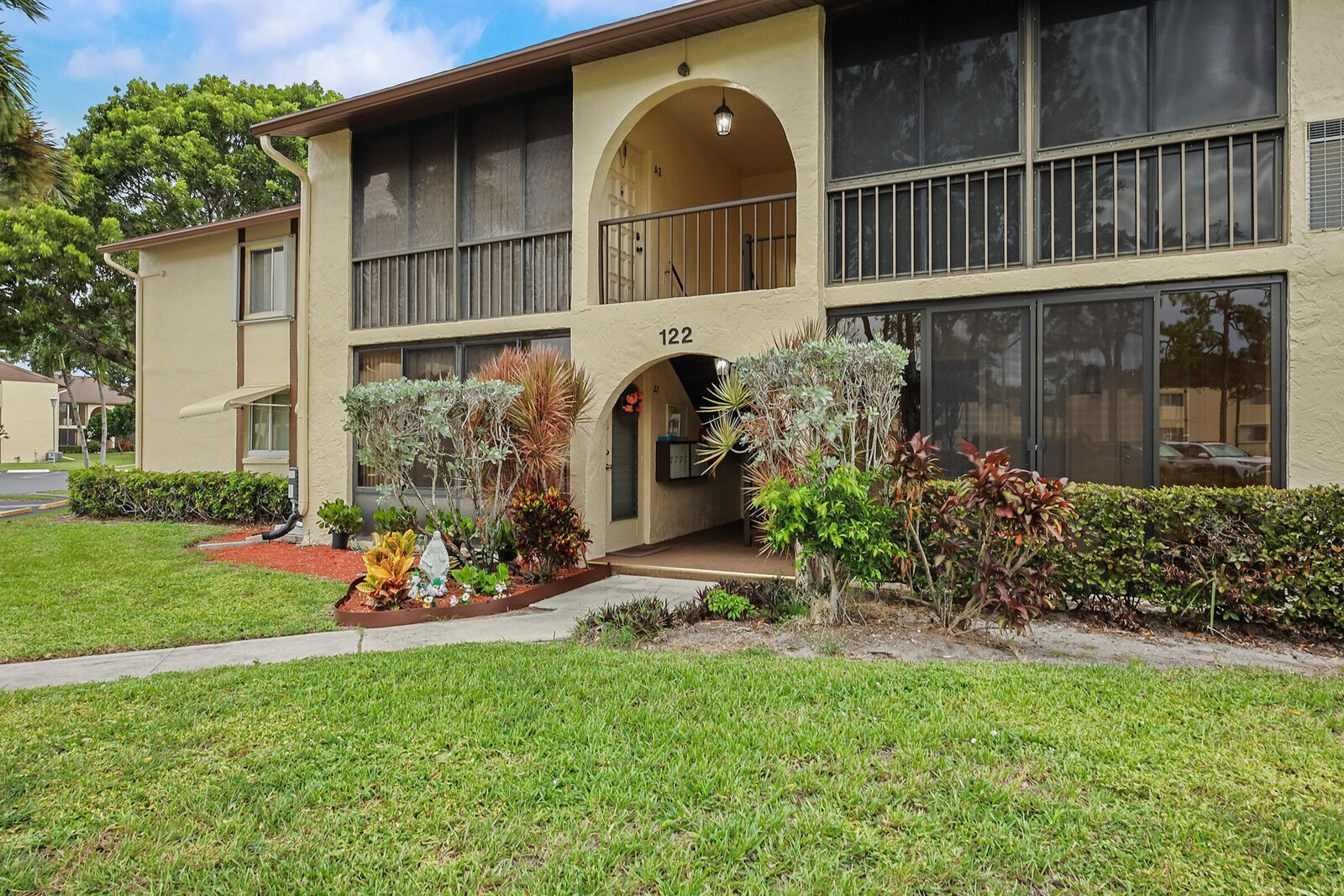 Property Photo:  122 Lake Pine Circle A-1  FL 33463 