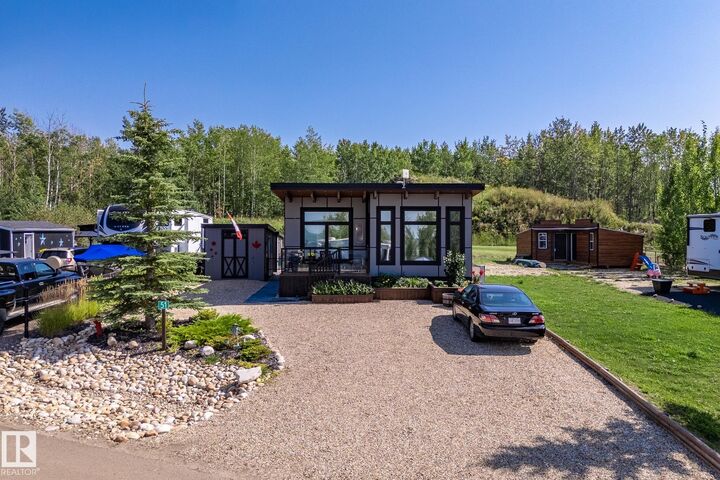 Property Photo: 53509 Rge Road 60 108 AB T7Y 0B5