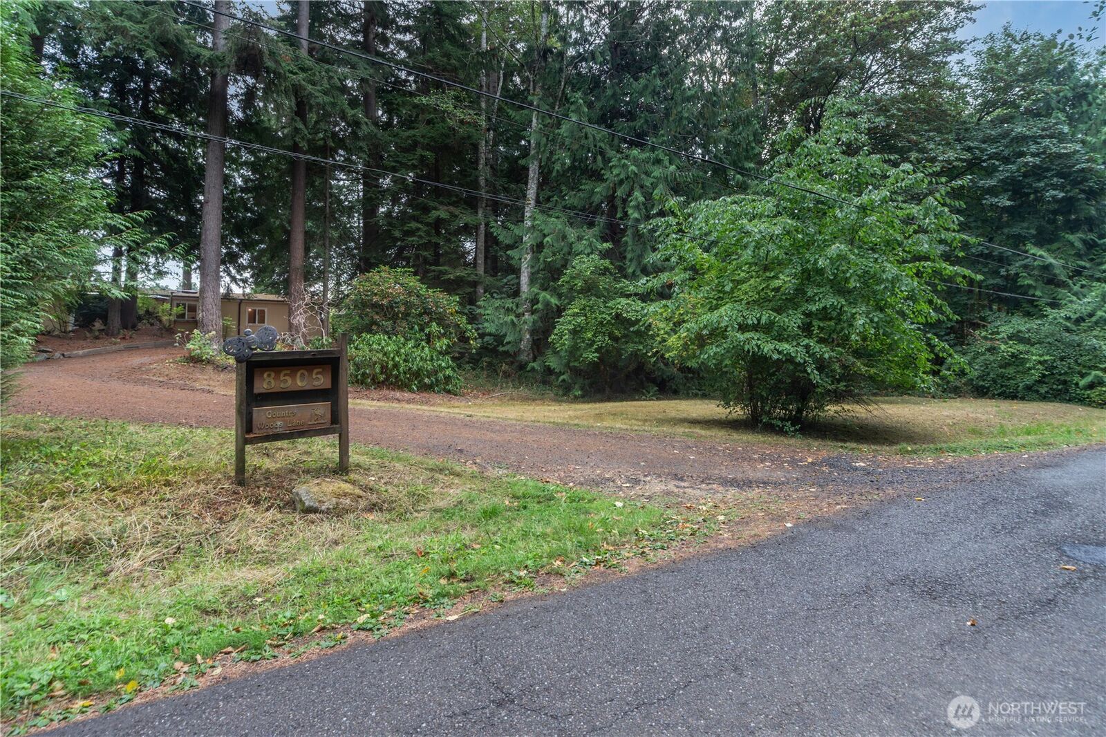 Property Photo:  8505 NE Country Woods Lane  WA 98346 