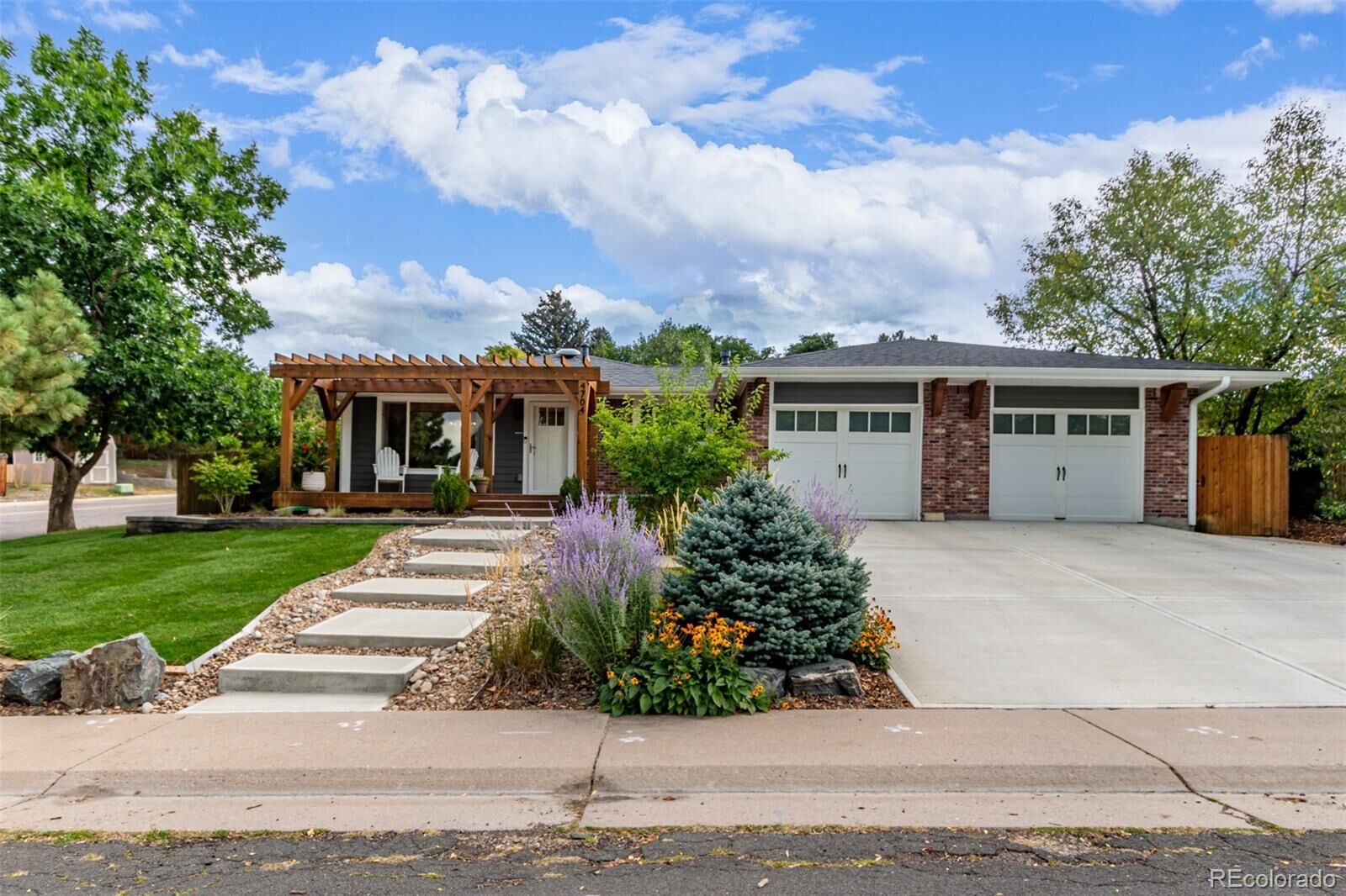 Property Photo:  4704 S Routt Street  CO 80127 