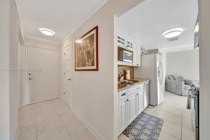 Property Photo:  126 Golden Isles Dr 43A  FL 33009 