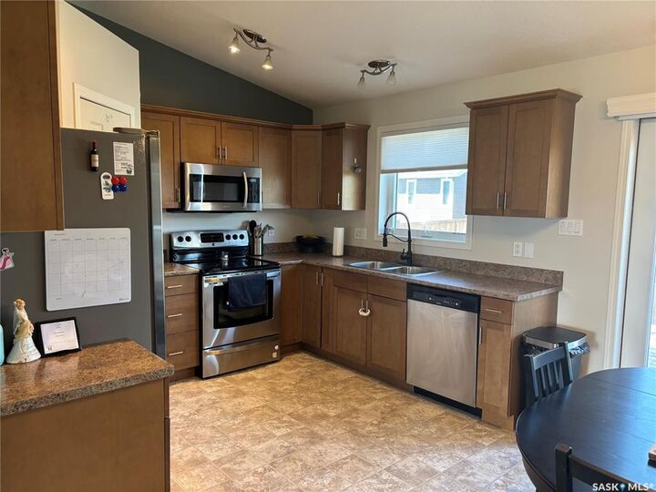 Property Photo:  813 Lochwood Place  SK S9H 4W9 