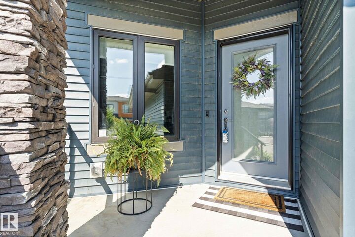 Property Photo: 6828 Knox Loop SW AB T6W 4R3
