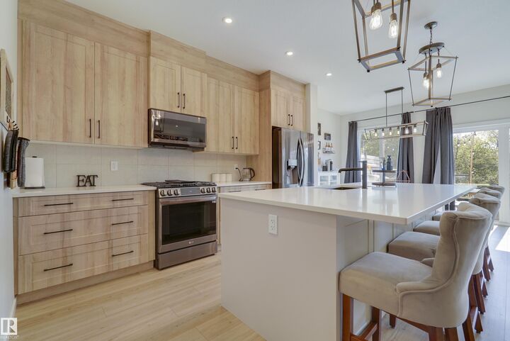 Property Photo:  1138 Cy Becker Road NW  AB T5Y 4C6 