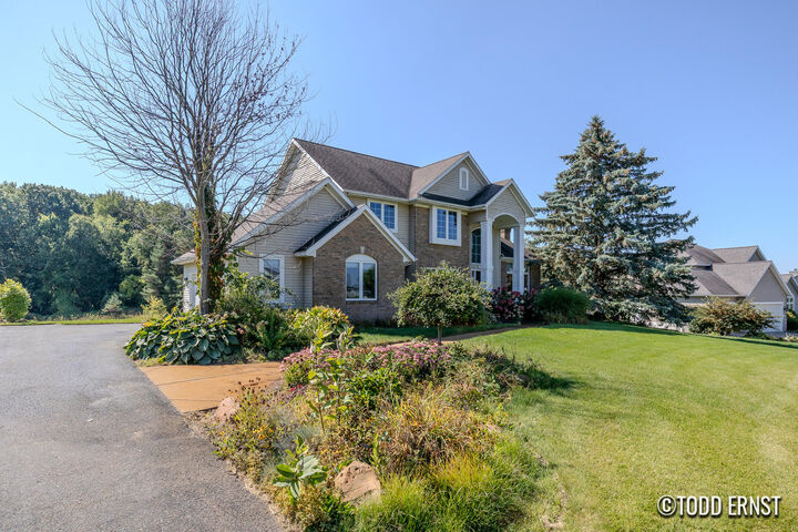 Property Photo:  5814 Cannon Hills Drive NE  MI 49301 