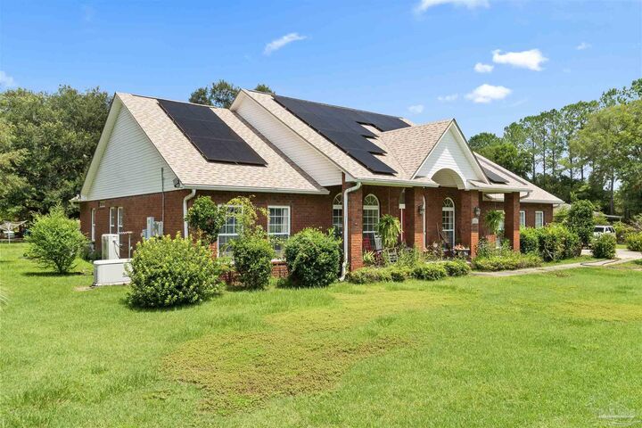 Property Photo:  5984 Happy Hollow Dr  FL 32570 