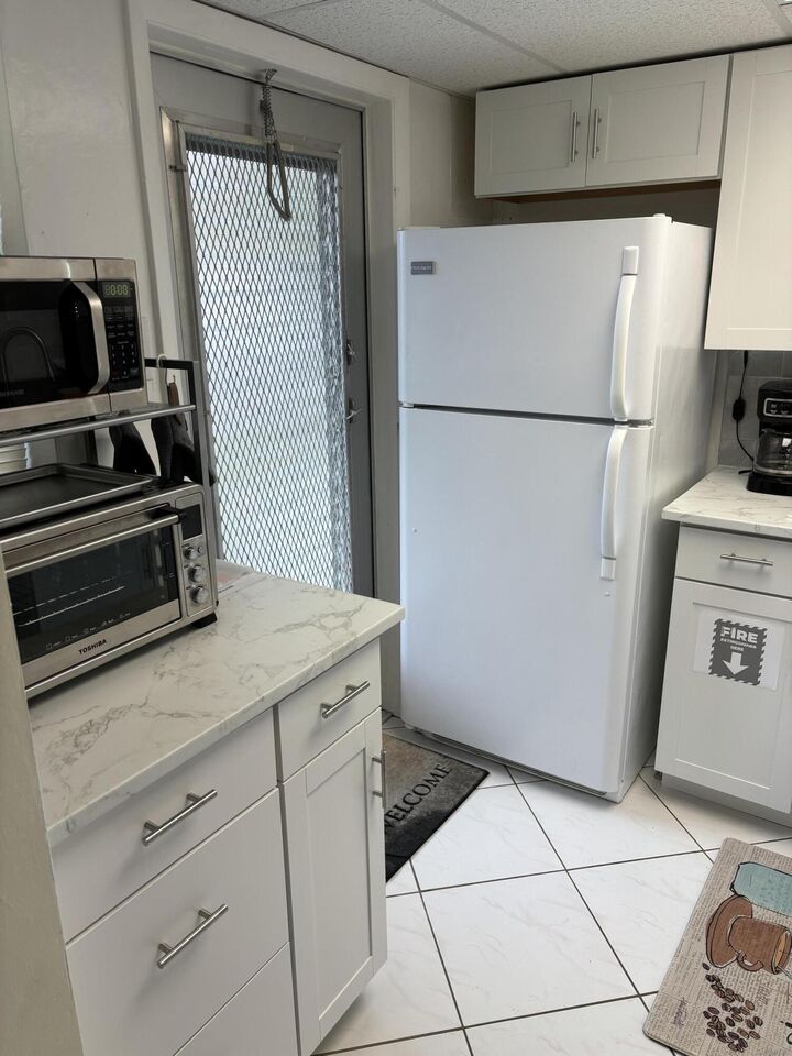 Property Photo: 2191 NE 1st Court 103 FL 33435