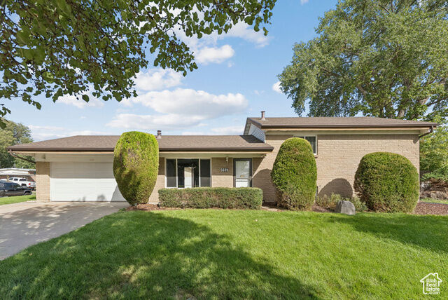 Property Photo: 5689 S Spacerama Dr W UT 84123