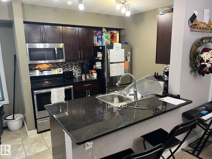 Property Photo:  107 Watt Common SW 101  AB T6X 2C6 