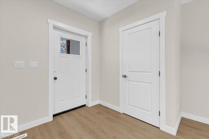 Property Photo: 9911 107 Street AB T8L 2H3