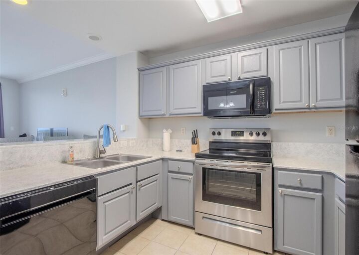 Property Photo:  13415 Blue Heron Beach Drive 407  FL 32821 
