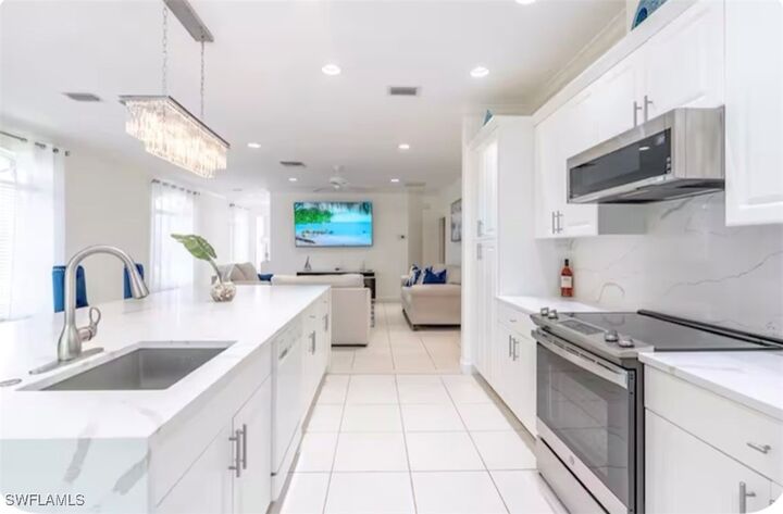 Property Photo:  593 106th Avenue N  FL 34108 
