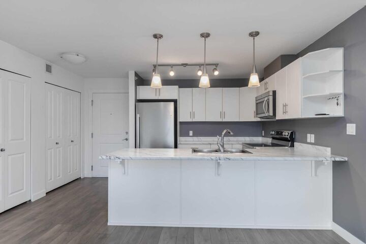 Property Photo:  115 Denholm Gate 409  AB T9H 0E9 