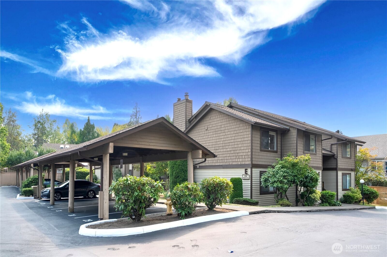 Property Photo:  737  143rd Avenue NE E18  WA 98007 