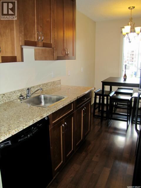 Property Photo:  202 250 Pinehouse Place  SK S7K 4X1 