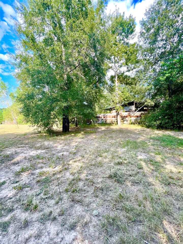 Property Photo:  3277 County Road 3479B  TX 77327 