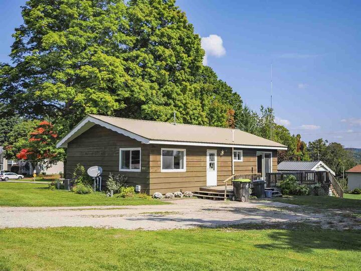 Property Photo:  501 Barker  MI 49727 