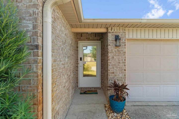 Property Photo:  7969 Promise Creek Rd  FL 32566 