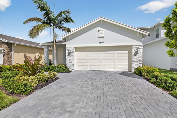 Property Photo:  5697 Graceful Way  FL 33484 
