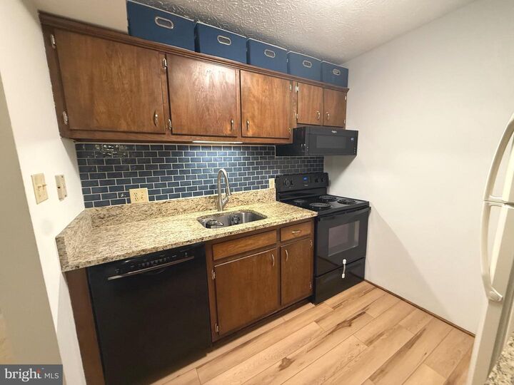 Property Photo: 44691 White Oak Court 503 MD 20619