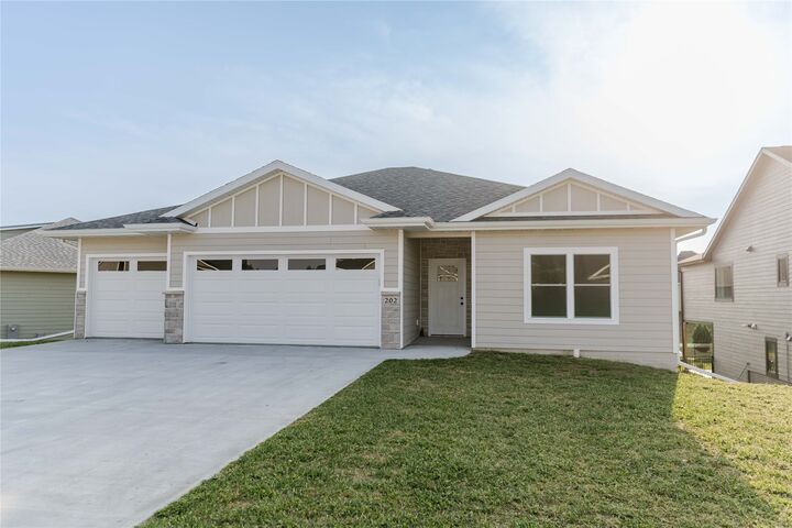 Property Photo:  202 Meadowlark Drive  IA 50170 