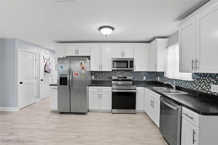 Property Photo:  4421 Bessie Avenue  FL 33905 